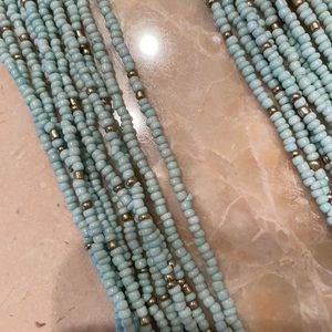 Long multi strand necklace